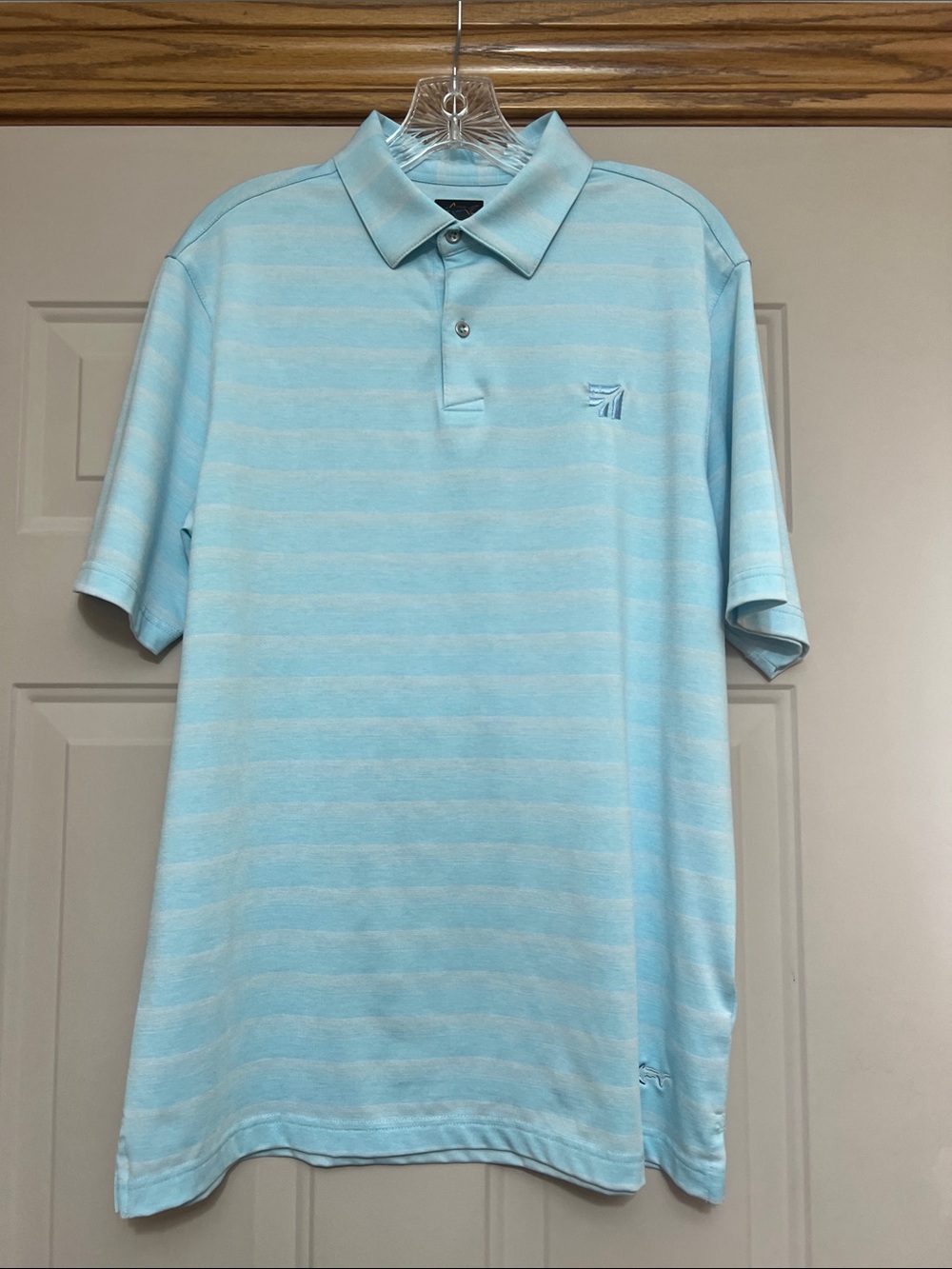 Greg Norman play dry golf polo.  BRANDED Cessna.